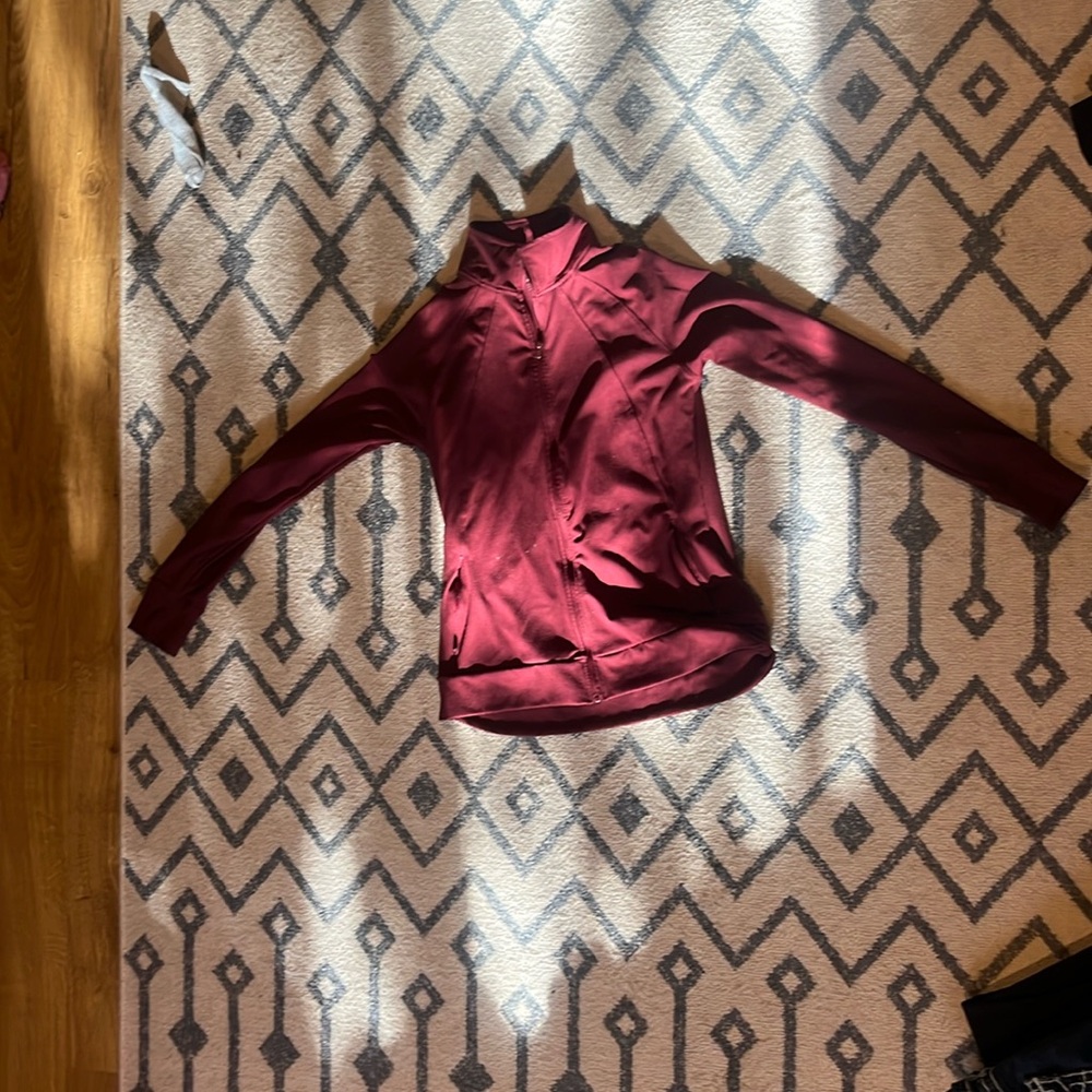 jockey women’s small maroon fleece jacket with pockets and thumb holes